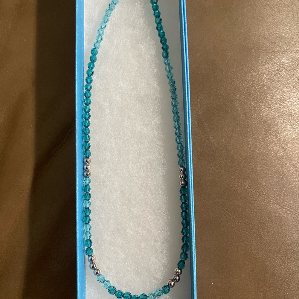 Two Tpuchstone Crystal by Swarovski. Both in beautiful blues.